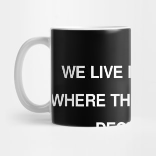 WE LIVE IN A WORLD WHERE THE POWERFUL DECEIVE US Mug